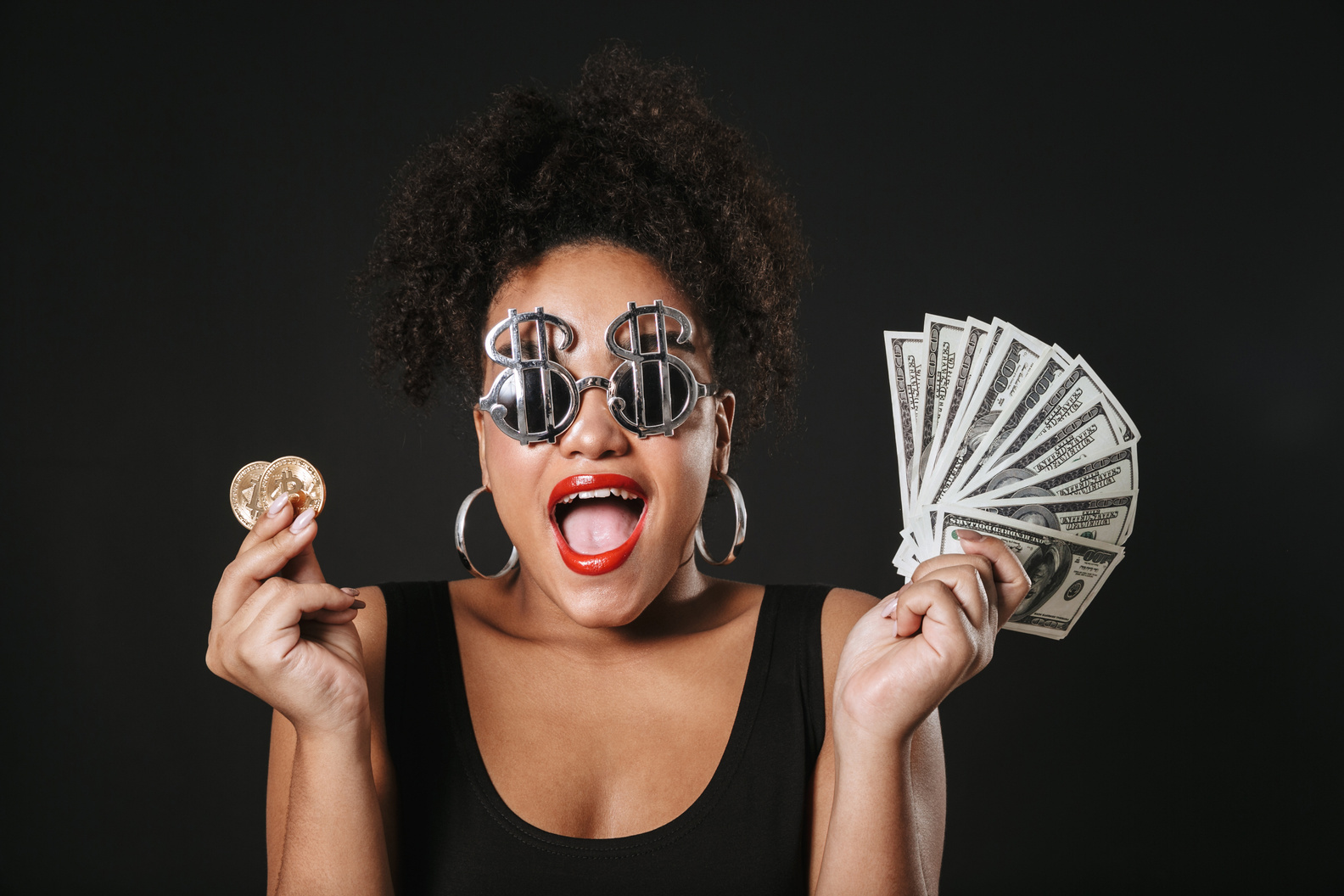 Image of Excited Afro American Woman Wearing Dollar Glasses Hold